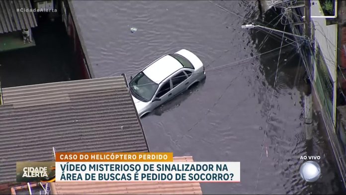 Carro com pessoas dentro fica preso em alagamento no Jardim Pantanal, em SP - RecordTV