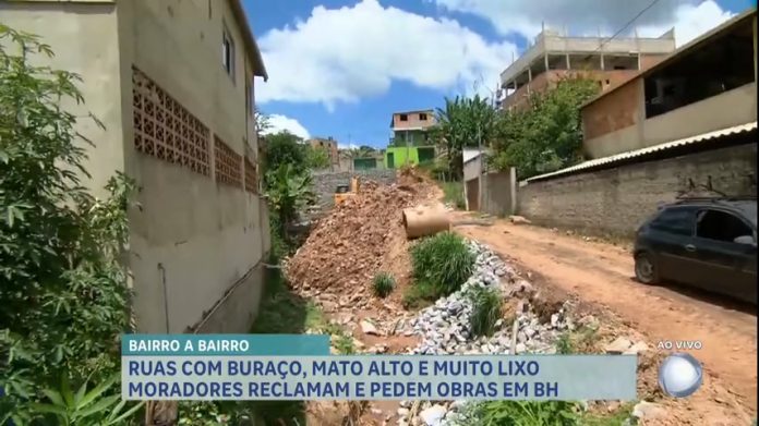 Bairro a Bairro: moradores reclamam de buracos, mato alto e excesso de lixo em rua de BH